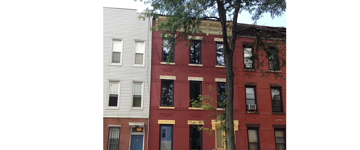 Tight Historic Masonry Rowhouse Renovation by Caliper Studio